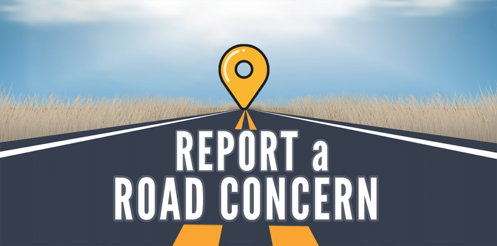 Graphic with text reading: Report a Road Concern